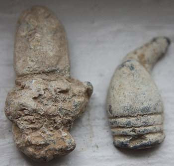 TL7431 Two Partially Melted Civil War Bullets   $8