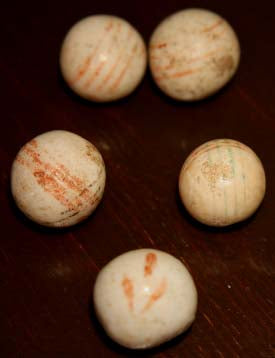 Five Clay Marbles